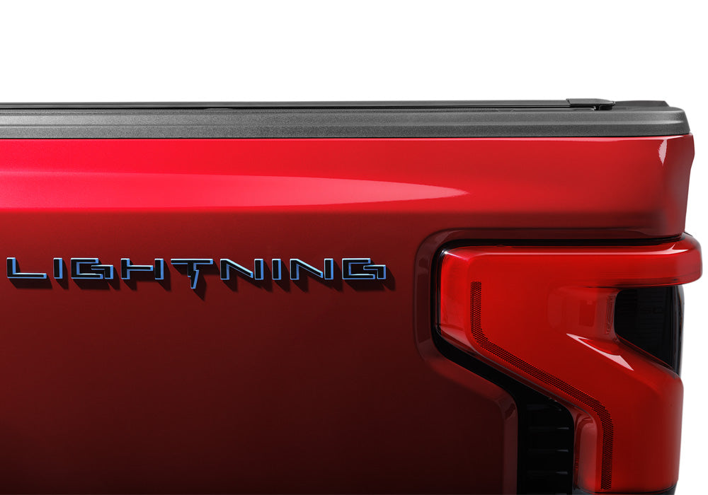 BK_BakflipMX4_22_FordLightning_RapidRed_Detail_08_LightningBadge.jpg